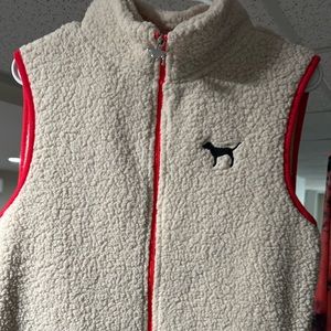 red and fuzzy white vest!